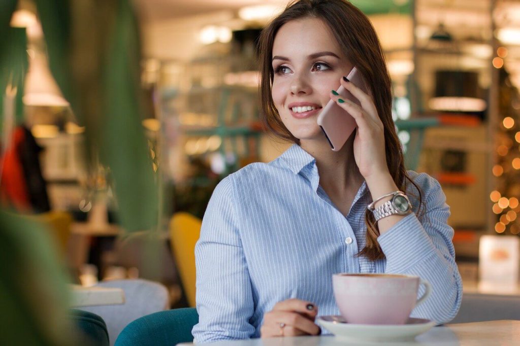 woman drinking coffee and eating healthy food