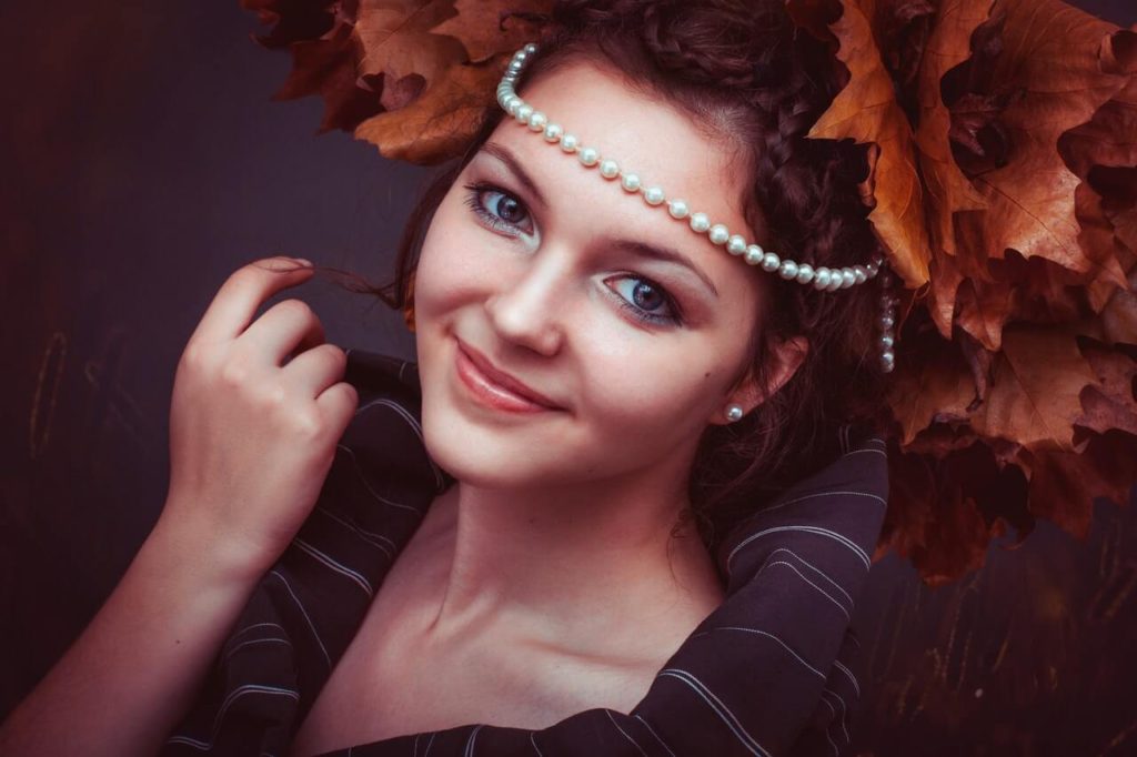 girl with pearls and beautiful long stylish hair