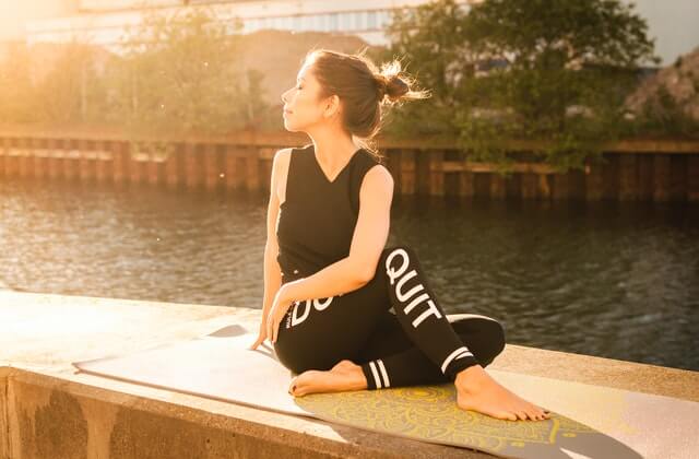 woman doing yoga for distress and mood