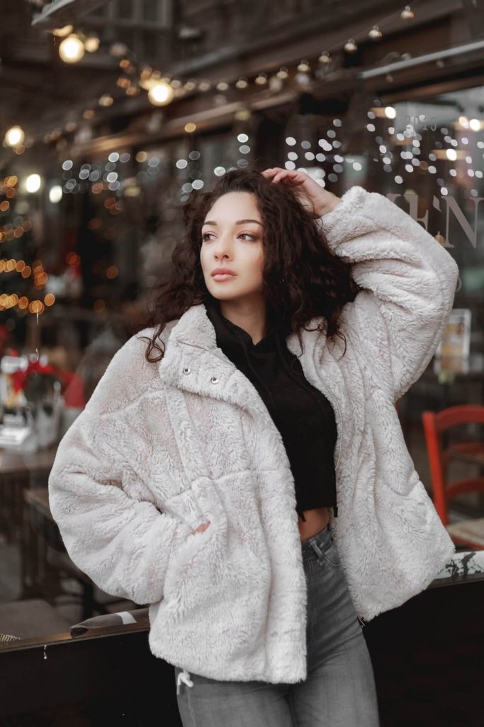 woman wearing white winter clothes