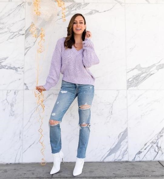 purple wool shirt and ripped jeans