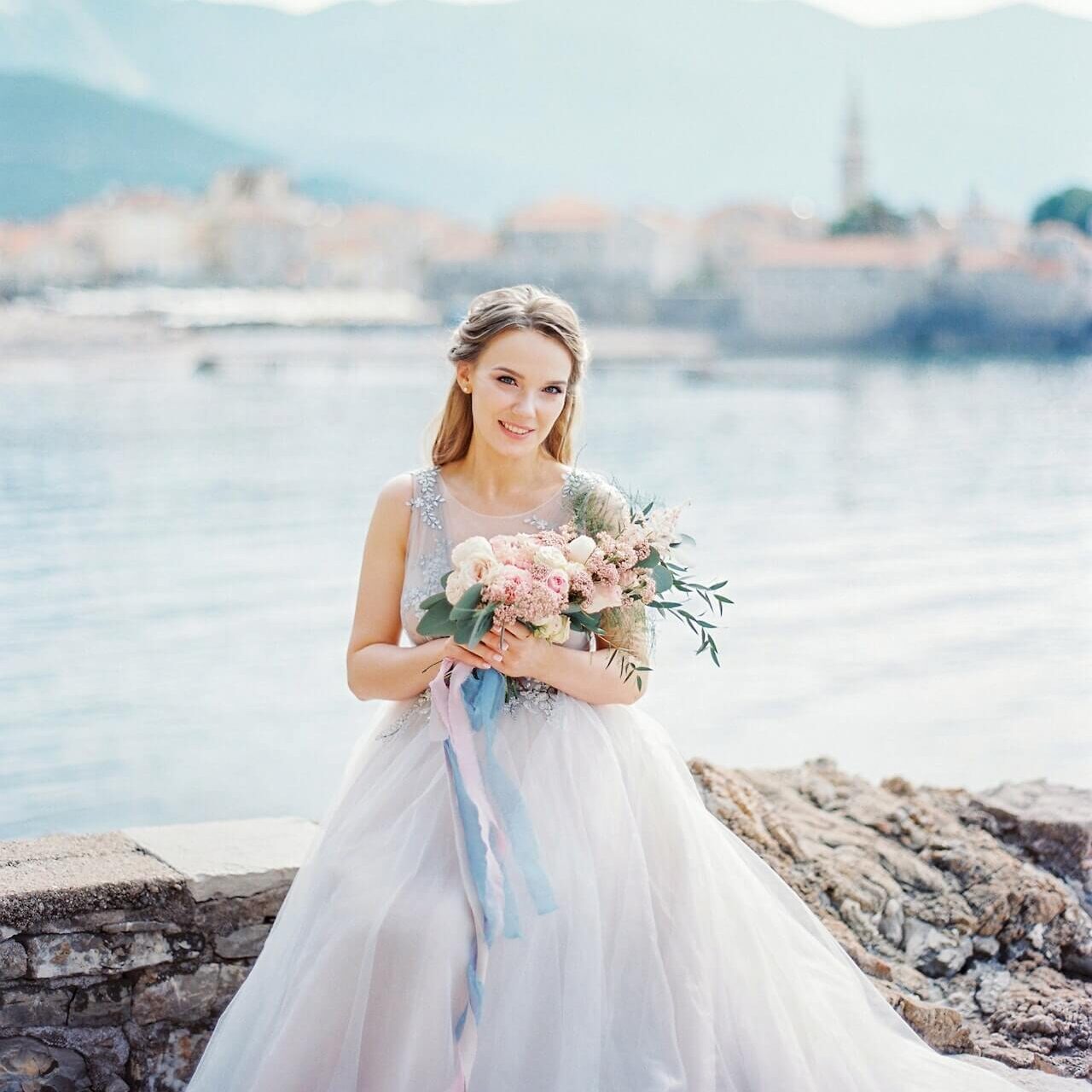 bride getting married at the beach Beach Engagement Photo Outfits